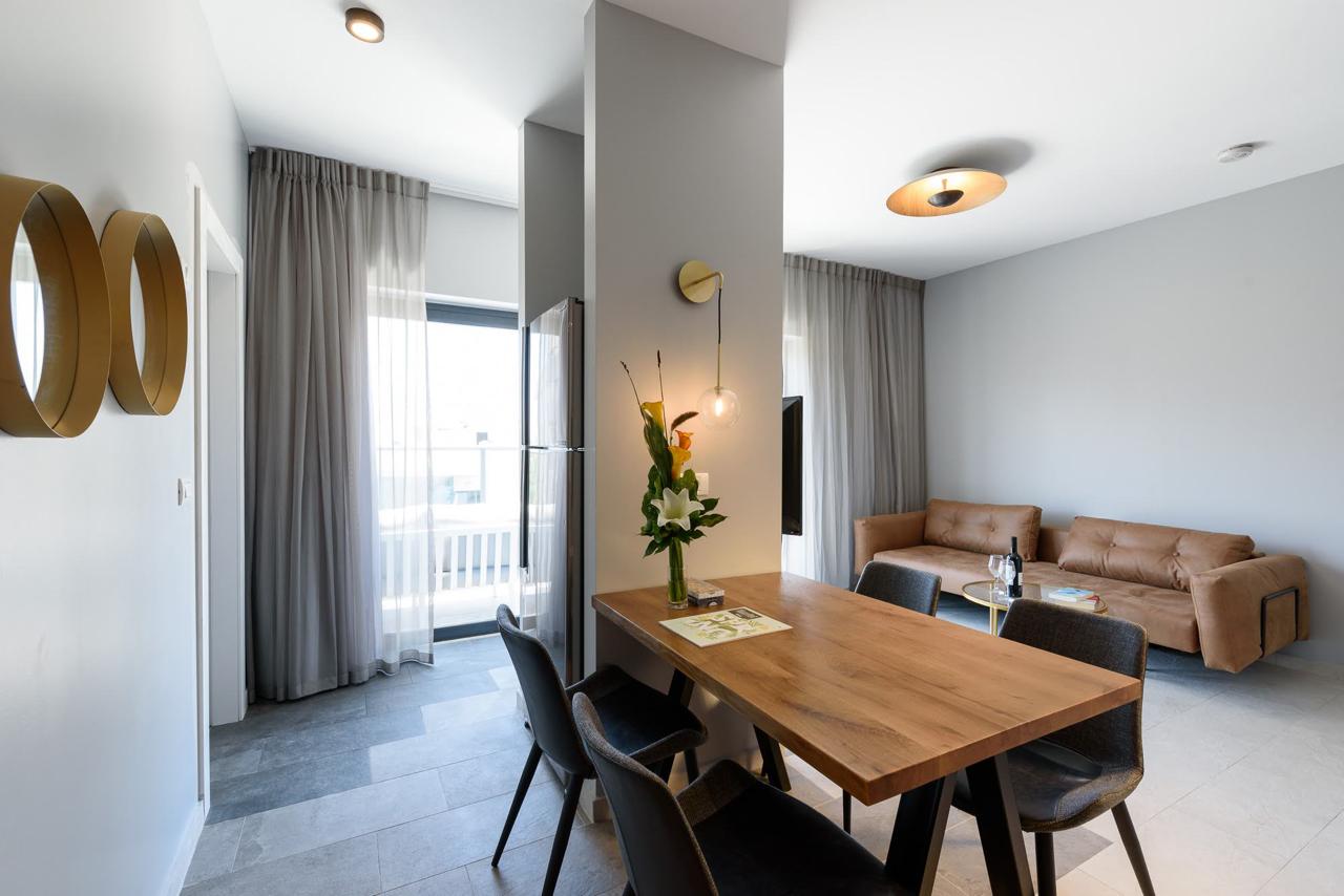 Sea Land Suites modern apartment with dining area and living room